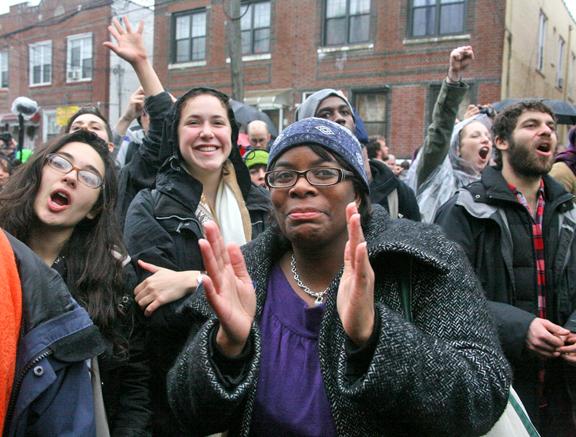 Occupy Wall Street rallying in support of a home reclaimed from foreclosure