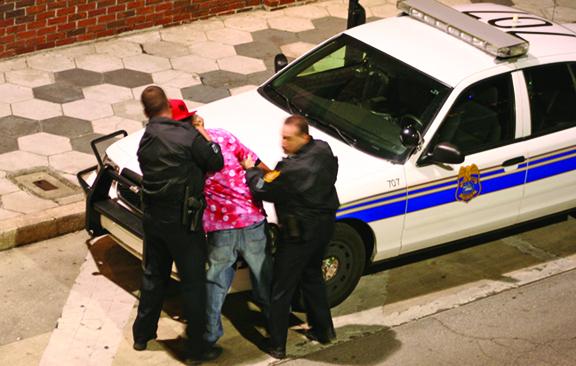 Police in Tampa, Fla., arrest an African American man on marijuana charges