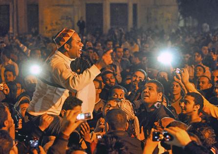Anti-Morsi protesters massed outside the presidential palace in Cairo