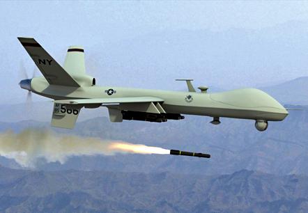 A Predator drone fires its weapons