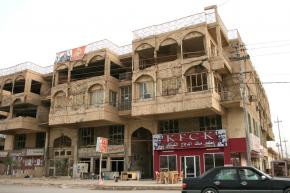 Four years after devastating U.S. attacks, Falluja shows few signs of "reconstruction"