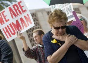 Protesting outside the Arizona state capitol building where lawmakers passed SB 1070