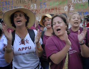 Members of the faculty union at the University of Puerto Rico show their support for the student strike