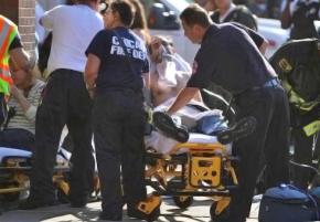 A Chicago subway rider receives treatment for smoke inhalation following a fire in the tunnels