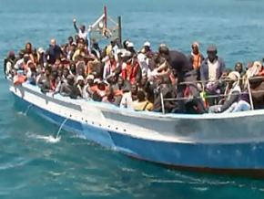 Dozens of refugees attempting to flee Libya on an ill-equipped boat