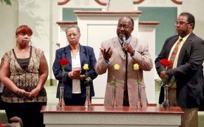 Community members mourn the victims of the racist shooting spree in Tulsa