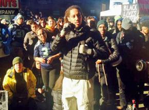 Protesters outside the Seahawks' stadium in Seattle call for taking a stand against racism