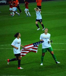 Hope Solo and Carli Lloyd celebrate at the 2012 Olympics